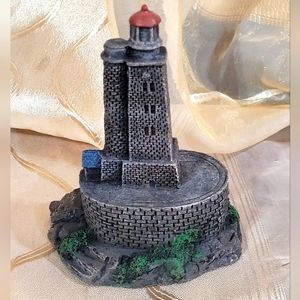 Lighthouse figurine.  Nautical Home Decor